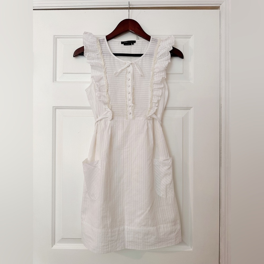BCBG Maxazria Size Small mini dress with pockets.